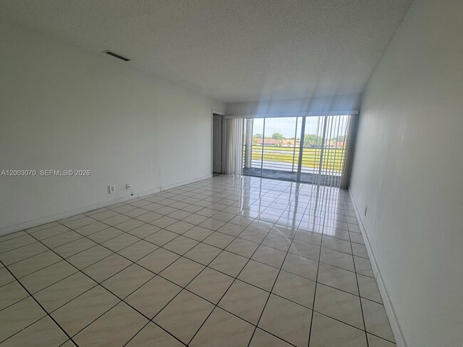 Building Photo - 7410 Woodmont Terrace