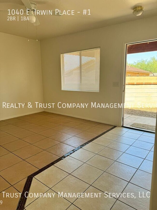 Building Photo - Centrally Located Duplex w/Tile Floors