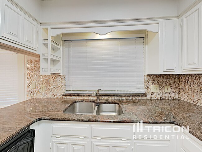 Foto del edificio - 6003 Meadowside Trail