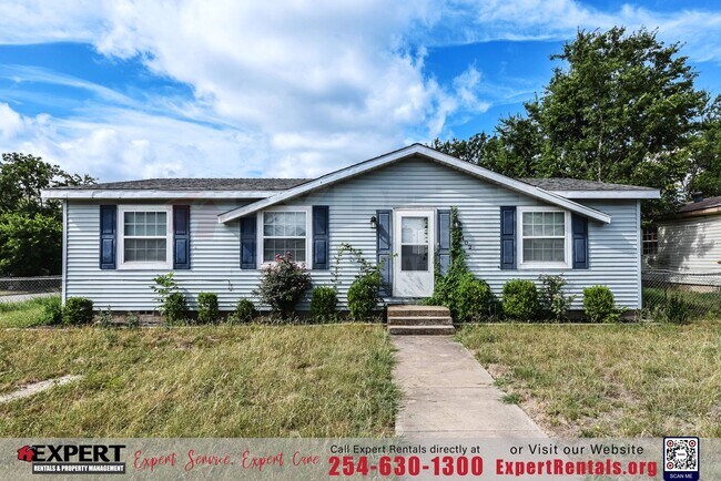Building Photo - A cozy 3-bedroom, 2-bathroom home nestled on a corner lot