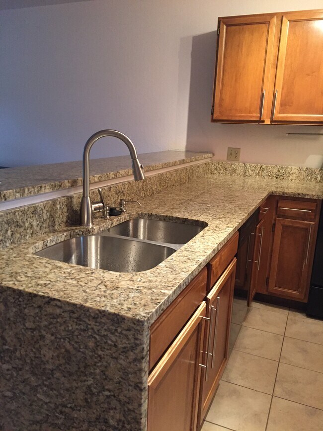 kitchen with a new granite counter top - 3525 28th St