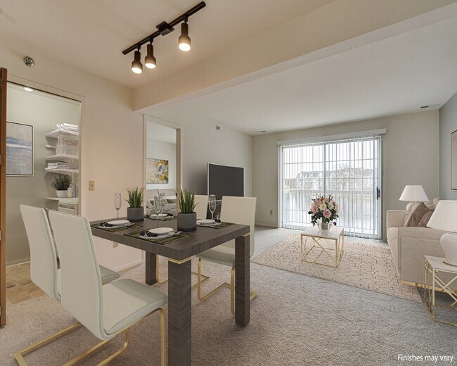 Área de comedor Azalea Layout con vista a la sala de estar - Portsmouth Apartments