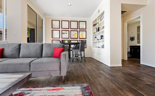 Built-in shelving is part of the wall, so the books have a place already. - Mountainside