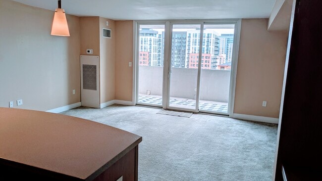 Living Room with triple slider - 601 W 11th Ave
