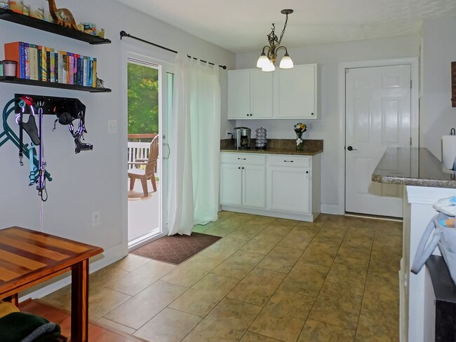 Building Photo - Colonial with Finished Basement and 2 Car ...