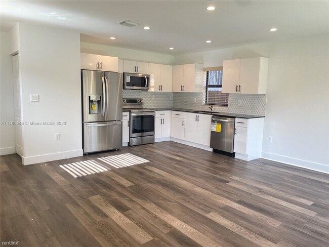 Building Photo - 3 br, 2 bath House - 1061 NW 31st St # 1