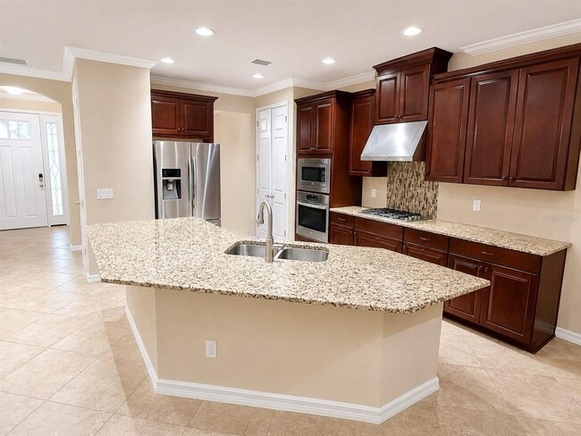 Building Photo - 8826 Tropical Palm Dr