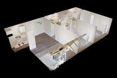 This single-floor unit offers a practical and well-organized layout across two bedrooms and one bathroom. The entry opens directly into the main living area, where wood-style laminate flooring extends underfoot and a ceiling fan overhead provides both light and airflow. A textured ceiling runs throughout the space, lending a consistent finish from room to room. The kitchen is positioned adjacent to the living area, partially separated by a partial wall. It features white cabinetry, a built-in range, and a dishwasher, offering essential functionality in a compact footprint.

Both bedrooms are carpeted and receive natural light through windows fitted with vertical blinds. One bedroom benefits from two windows, allowing ample daylight to fill the room, while the other opens to an outdoor view through a full sliding glass door with vertical blinds. Each bedroom includes a sliding-door closet with a hanging rod and upper shelf for storage. The bathroom is clean and straightforward, featuring a white tub-shower combination with chrome fixtures. The overall palette throughout is neutral, with white walls and light tones creating a bright, move-in-ready environment.