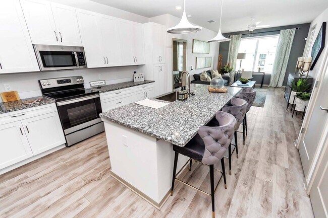 Building Photo - AVLI AT CROSSTOWN CENTER APARTMENTS