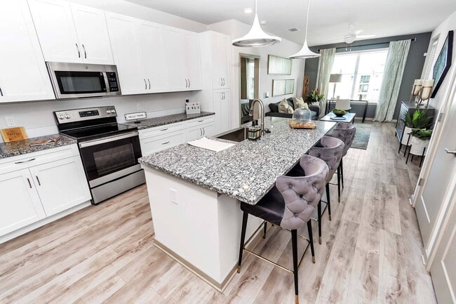 Building Photo - AVLI AT CROSSTOWN CENTER APARTMENTS