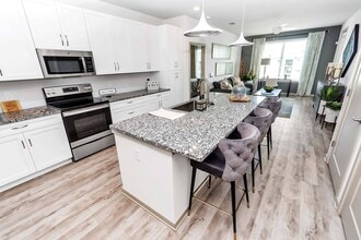 Building Photo - AVLI AT CROSSTOWN CENTER APARTMENTS