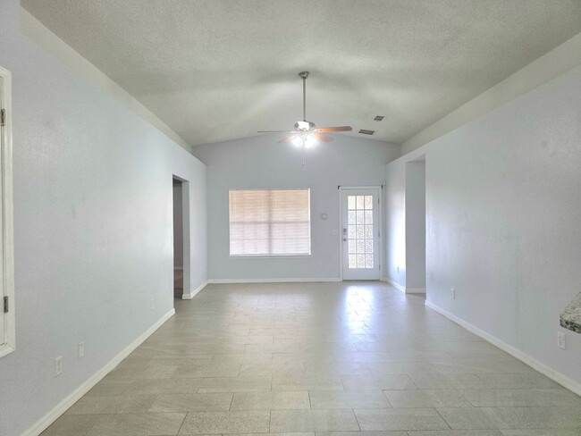 Building Photo - Charming 4BR/2BA Brick Home with Solar Panels