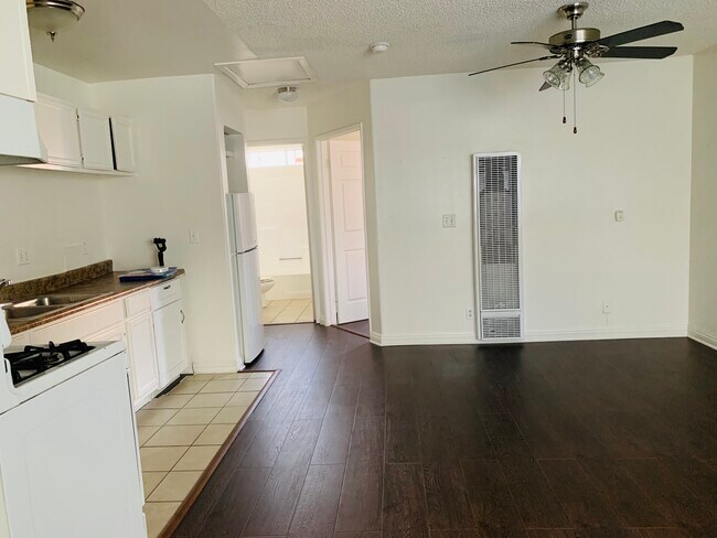 Kitchen & Living Area with new floors! - 136 N Mariposa Ave