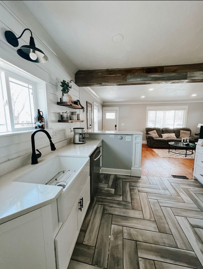 Our kitchen is open to the living room. - 624 Park St