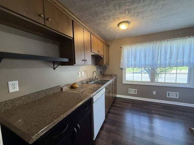 Foto del edificio - 1402 N Miles St