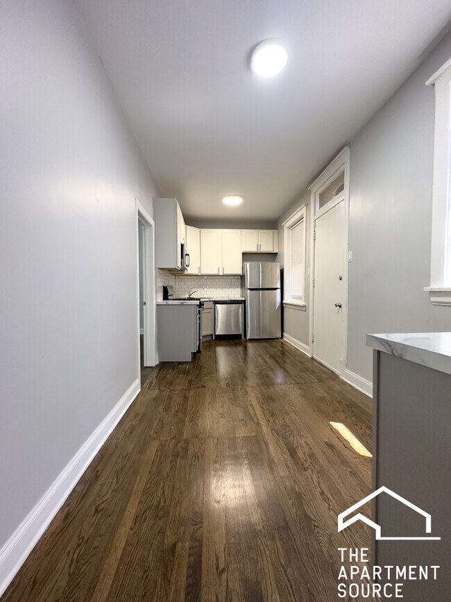Foto del edificio - 6259 N Lakewood Ave
