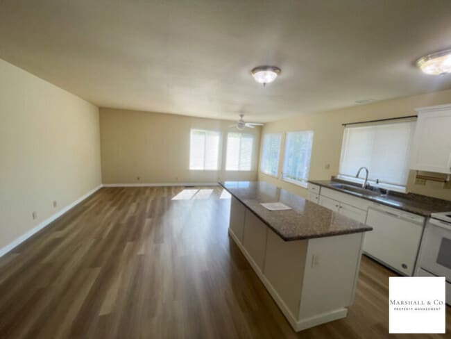 Building Photo - UPDATED AND BEAUTIFUL 2BR/1BA DUPLEX TOWNHOME, NEW WOOD FLOORING, PRIV. ENCLOSED BACK YARD, 2 CAR GA