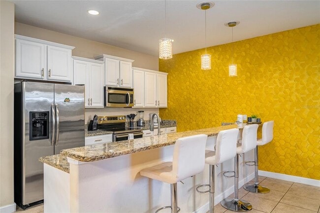 Building Photo - 8897 Candy Palm Rd