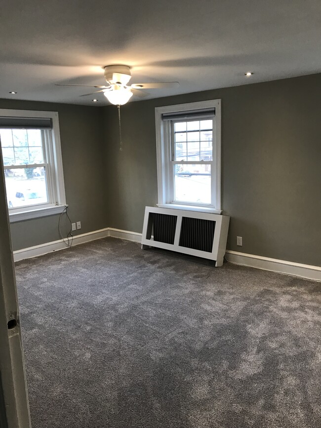 Expansive living area, newly renovated with new carpeting - 430 Main St