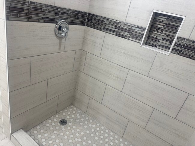 Walk in recently remodeled tiled shower - 534 Radiance Ave