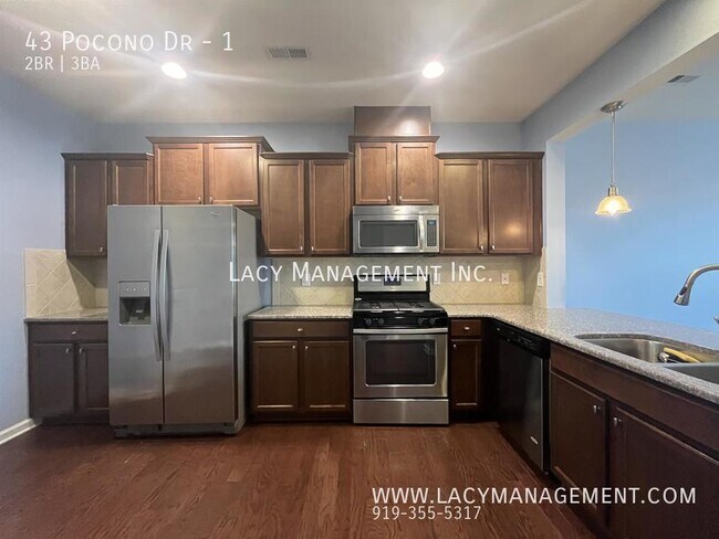 Building Photo - A Townhome Equipped with Modern Appliances