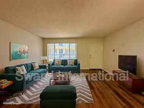 Building Photo - 26114 Belle Porte Ave