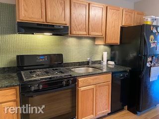 Building Photo - 2 br, 1 bath Condo - 8039 Lake St 2