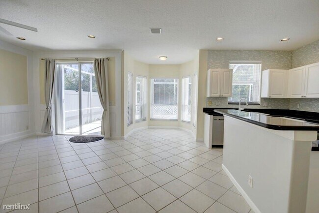 Foto del edificio - 4 br, 2.5 bath House - 7715 Colony Lake Dr