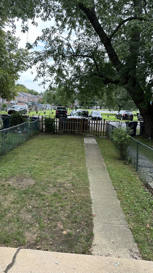 Fenced back yard with off street parking - 1010 Baltimore Ave