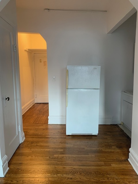 view of kitchen and hall from main living area - 57 W 105th St