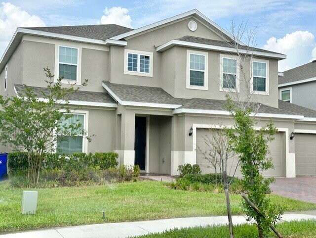 Building Photo - "Spacious Elegance in St. Cloud: 5-Bedroom...