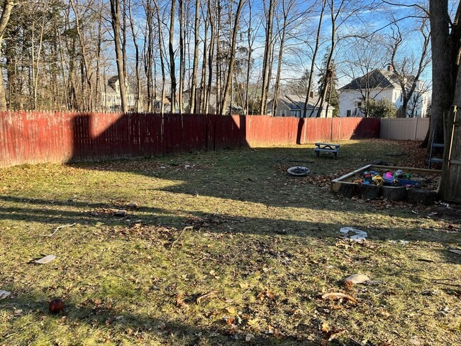 large partially fenced back yard - 14 Charles St