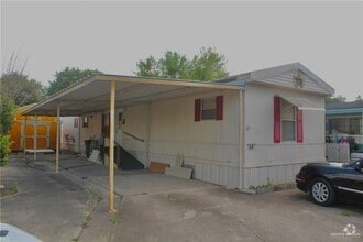Building Photo - 1304 Breezy Dr