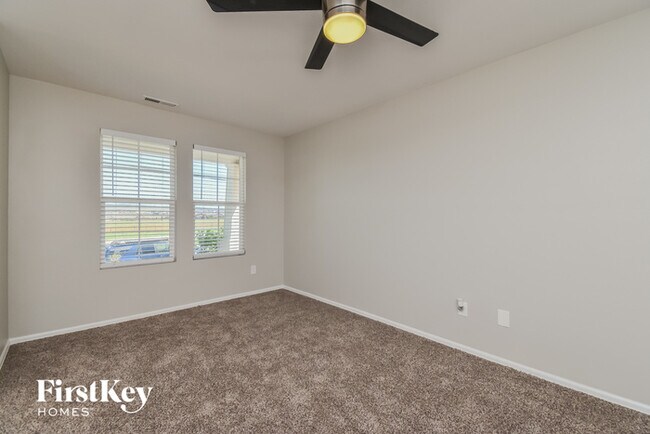 Building Photo - 6255 Sorpresa Ln