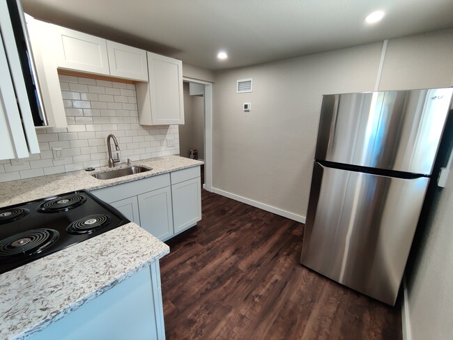 Kitchen with Stainless Steel Appliances and Garbage Disposal - 1814 26th St W