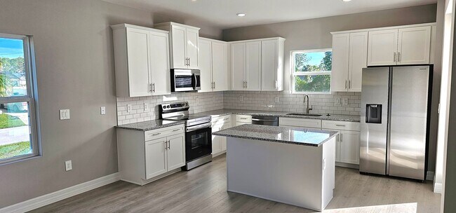 Building Photo - NW Palm Bay 4-Bedroom, 3-Bath Corner Lot.