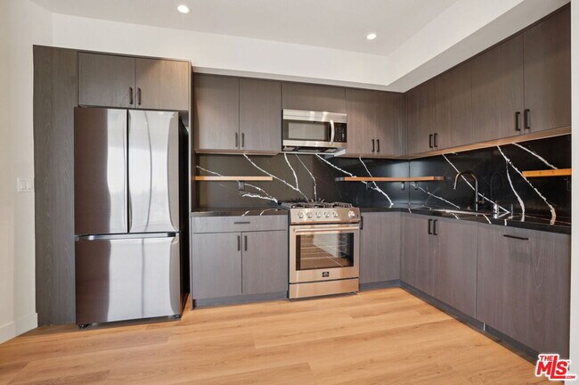 Foto del edificio - 1110 Spaulding Ave