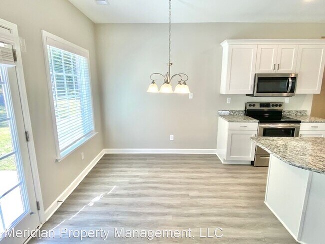 Building Photo - 4 br, 2.5 bath House - 5528 Tucker Landing