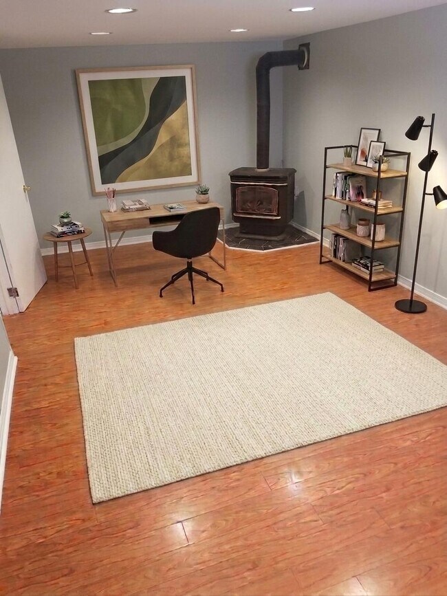 Photo du bâtiment - 1 Bedroom with Parking Near West Mountain