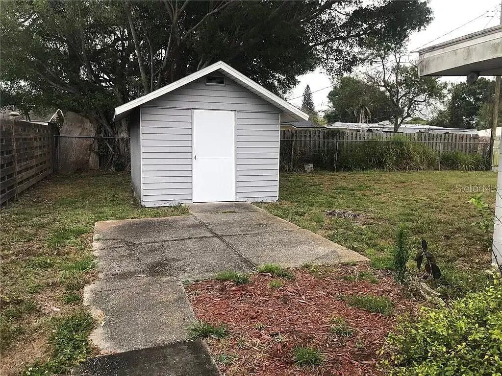 Private yard with storage shed. - 4805 23rd St W
