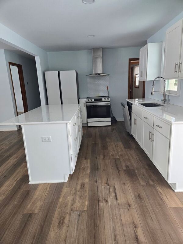 Building Photo - 4656 Ensign Ave N