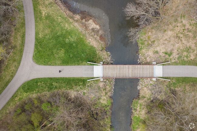 Aerial view of walking path over creek running through White Park in Whitehills