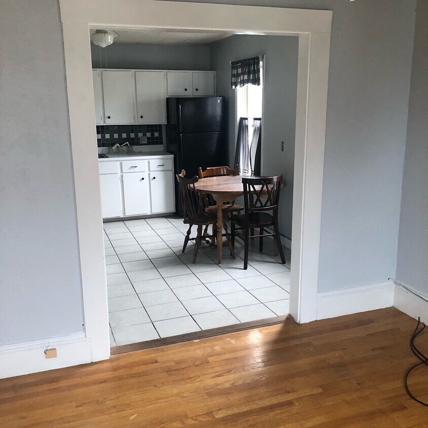 Kitchen opened to living room - 203 6th St