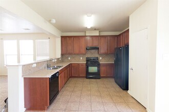 Building Photo - 8011 Singing Sonnet Ln