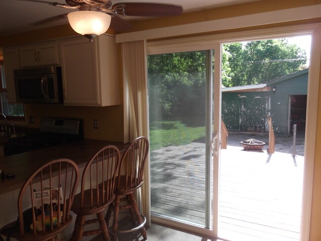 deck right outside the kitchen overlooking private yard - 1723 Grove st