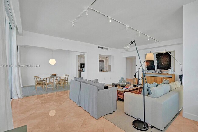 Building Photo - 10205 Collins Ave