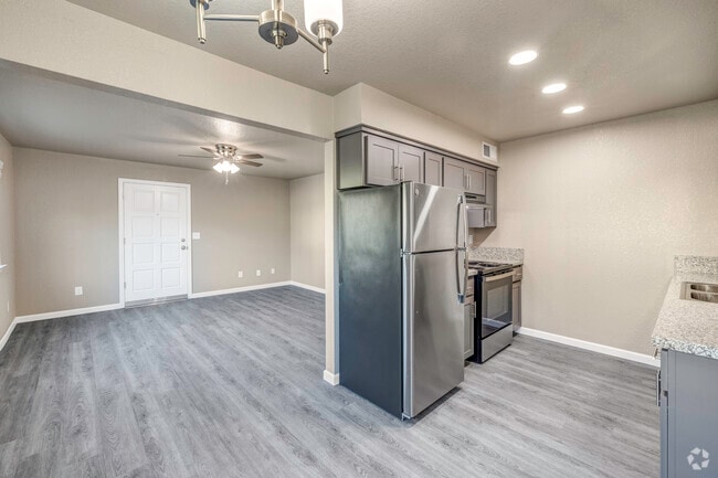 View of kitchen and living room - Casa de Paz Apartments