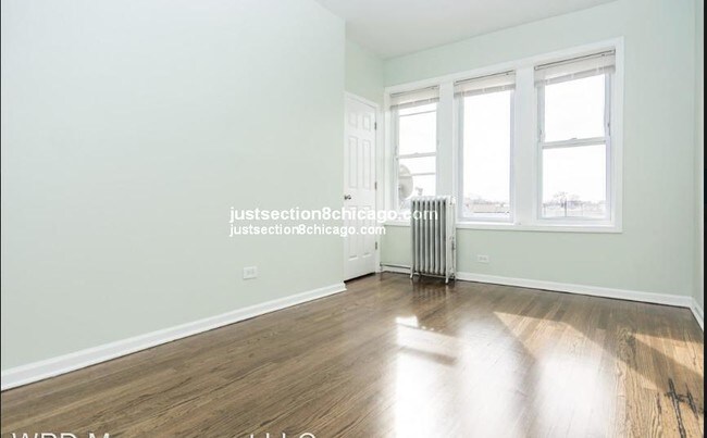 Building Photo - 7238 S Cornell Ave