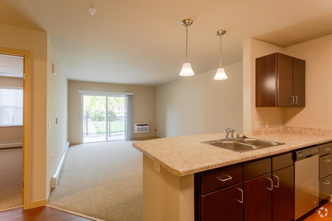 Living Room - Uptown Commons II Senior Apartments