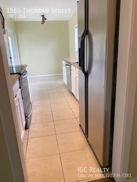 Building Photo - Bright and updated 3/1.5 in Titusville Rea...